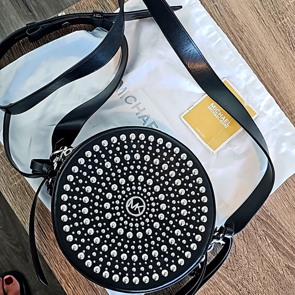 Michael Kors' small bag last pic shows the approximate size